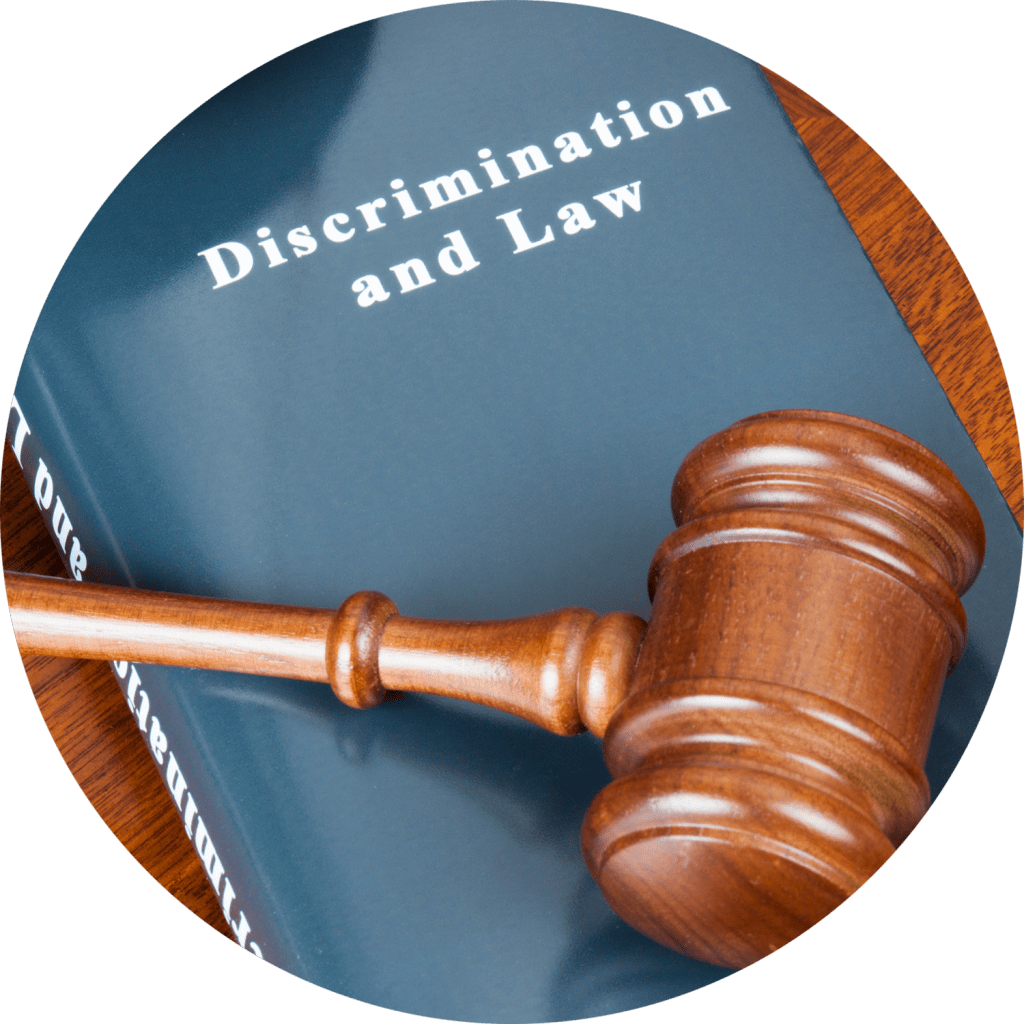 A gavel on top of a book titled Discrimination and Law.
