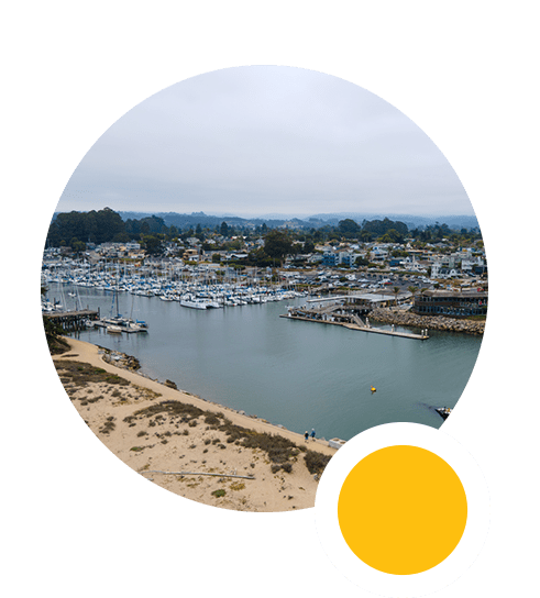 An aerial view of the Santa Cruz Harbor filled with boats.