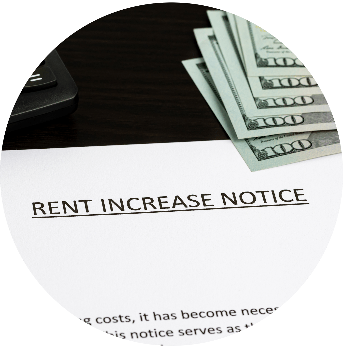 Cash sitting on top of a piece of paper with the title "Rent Increase Notice".
